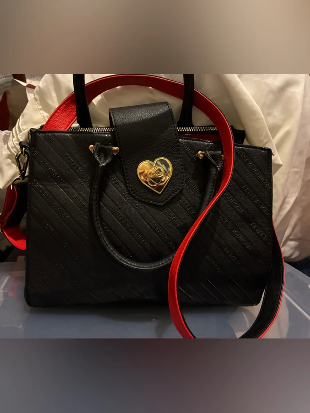 Betsey Johnson Quilted Satchel with gold heart clasp and contrasting red handle